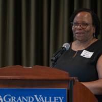 Dean Sherril Soman smiles during her remarks